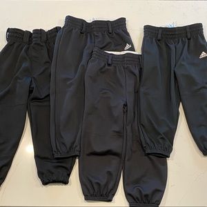 4 pairs of black t-ball/baseball pants